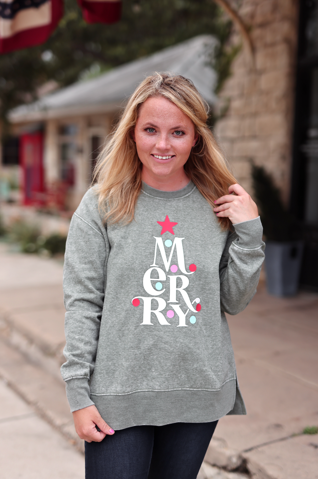 Women's gray sweatshirt with 'Merry' tree design, festive graphics, comfortable material, perfect for holidays.