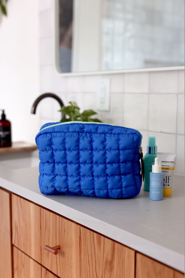 On Cloud Nine Quilted Puffer Cosmetic Bag - (Cobalt Blue)