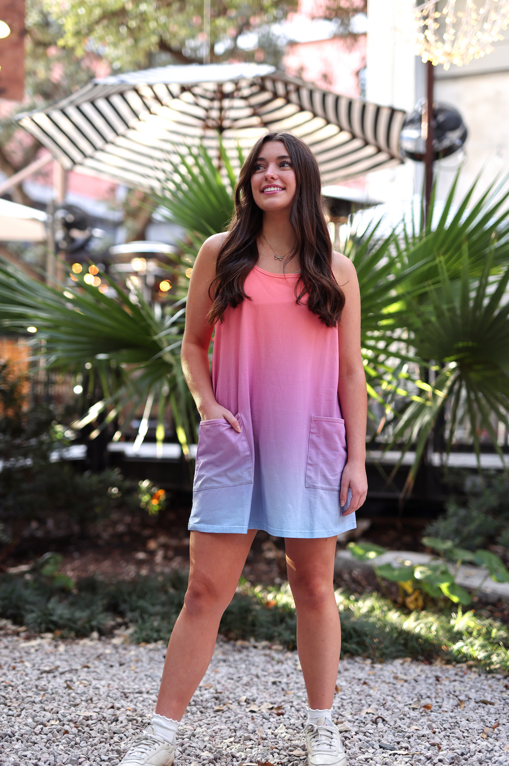 Women's ombre tank dress in pink and blue, featuring side pockets and a relaxed fit.